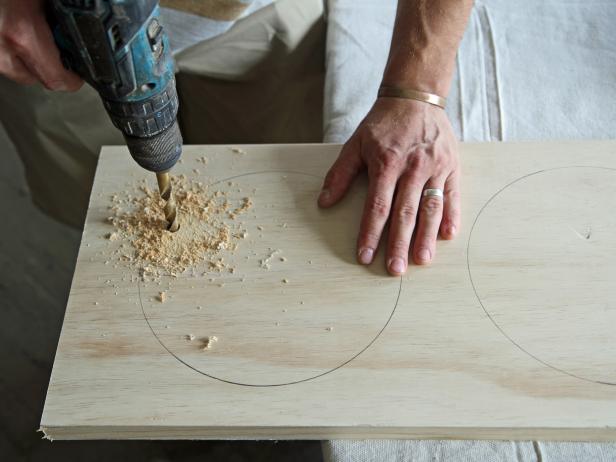 Drill a hole inside each traced circle using a 1/2” drill bit.