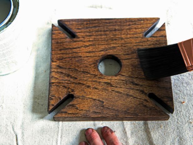 Apply a coat of clear satin polyurethane to preserve and protect the wood and finish.