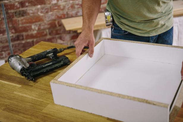 Make a table form from melamine pieces.