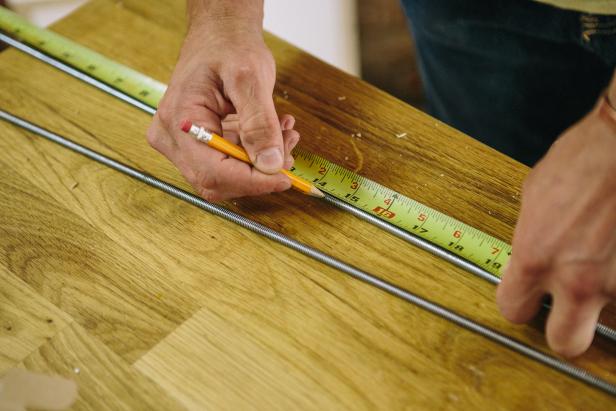 Mark threaded rods at 14-1/2 inches with a pencil.