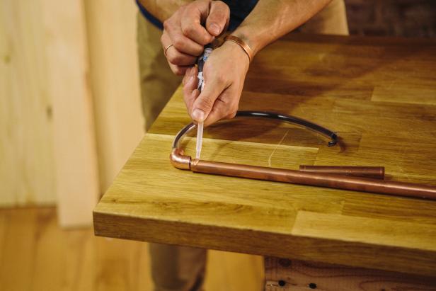 Attach a 4-inch pipe piece with epoxy.