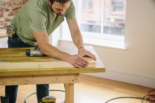 Attach first wood pieces using wood glue and a nail gun.