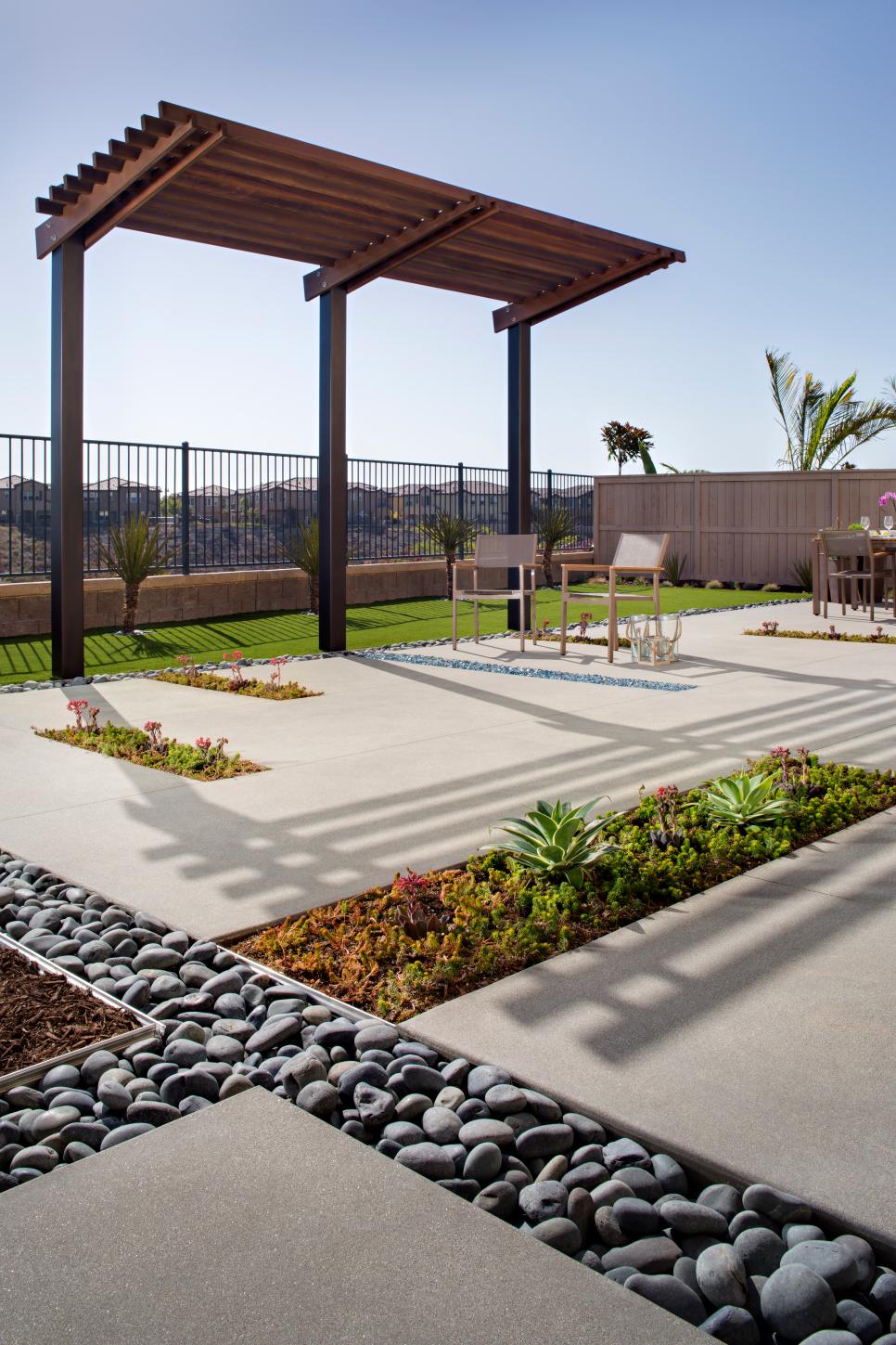 Planters Inside Concrete Patio in Contemporary Backyard Contemporary Backyard With Open View