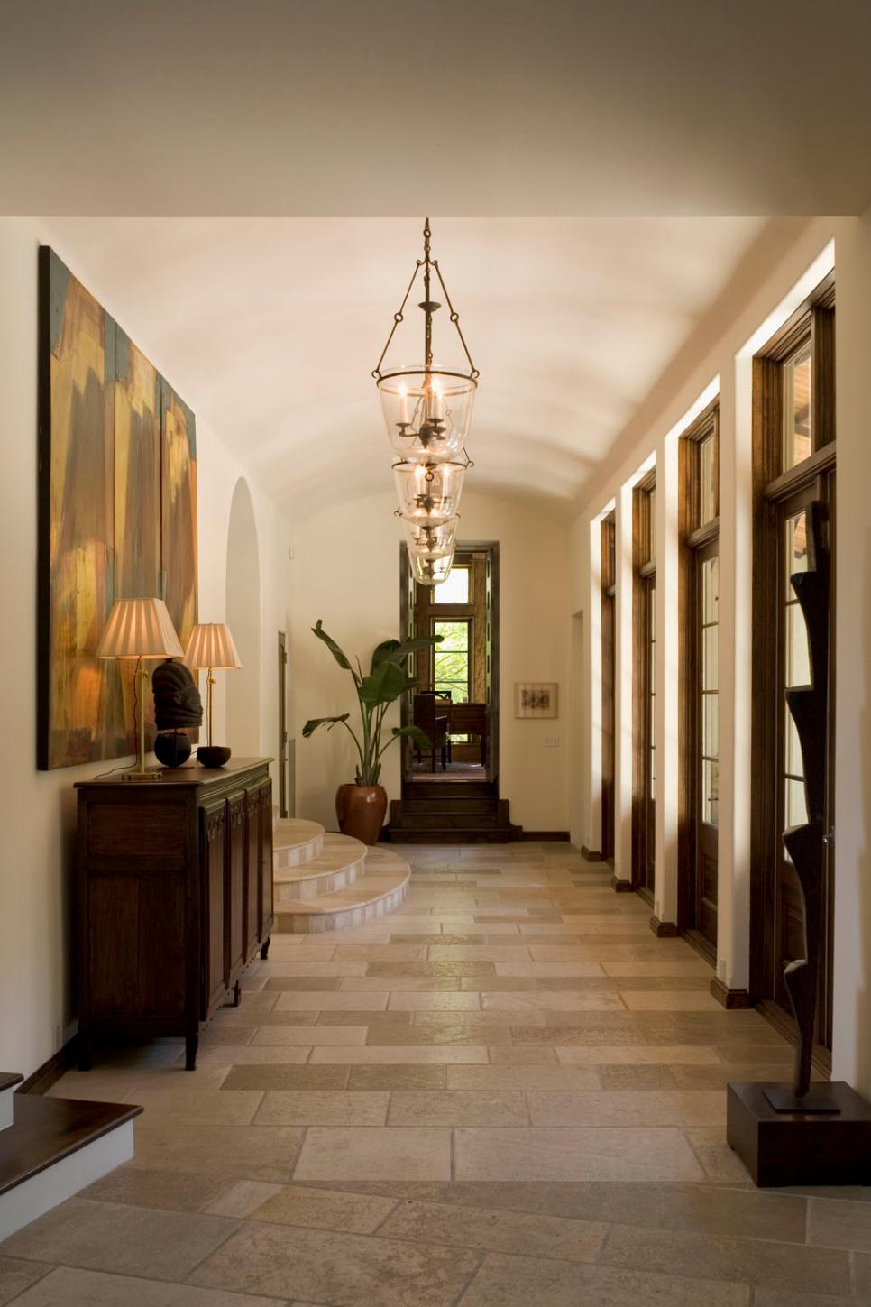 Hallway With Stone Floors Hallway With Glass Pendant Lights