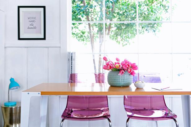 Light and Bright Home Office With Pink Acrylic Chairs