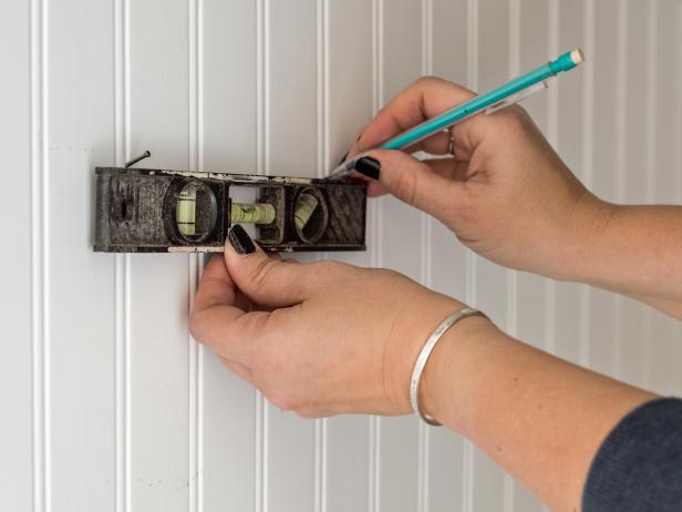 Step 2: Hammer Second Nail into Wall Step 2: Hammer Second Nail into Wall