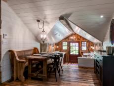 White Country Dining Room With Pitched Ceiling