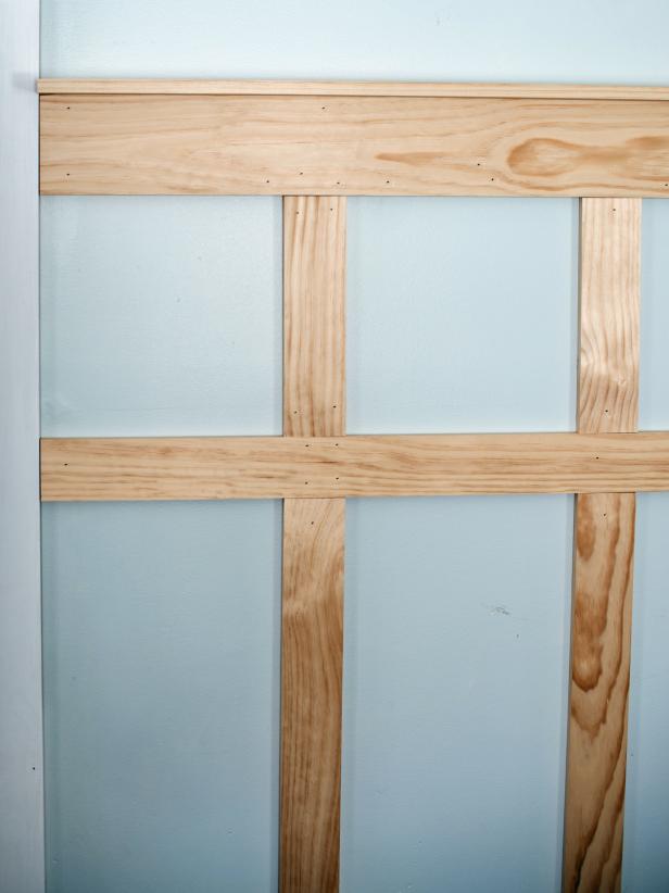 Some adjustments may need to be made around light switches and outlets. Pattern may also be adjusted under windowsills, around built-in pieces, etc. Repeat steps #1-4 around the room until wainscoting is complete.
