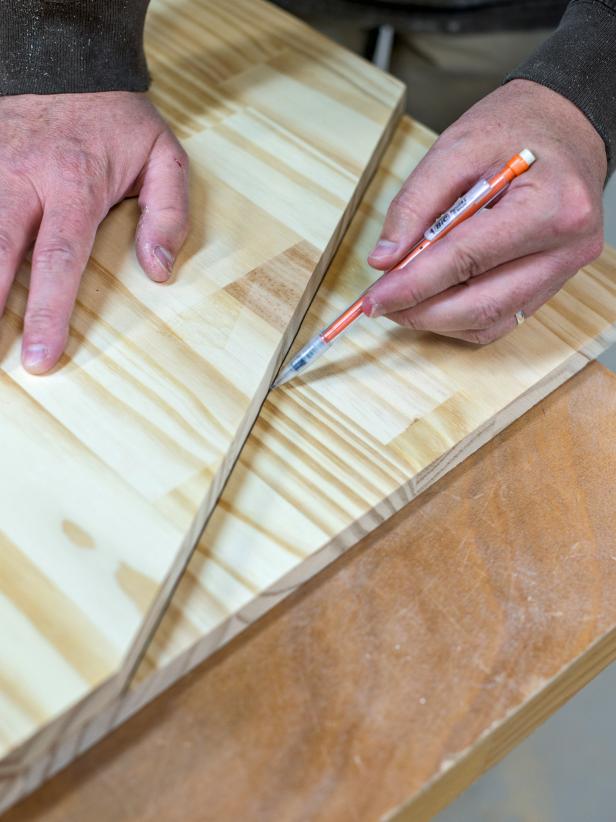 Cut wood to sizes in supplies list either at home or at hardware store. Take one 16” square piece and measure and mark angle to match diagram. Cut marked line with a circular saw. Use first cut piece as a template for the other three. Mark and cut remaining three pieces. Tip: Clamp wood piece to stable work surface while cutting with the circular saw to prevent it from shifting.