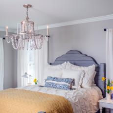 Gray Cottage Master Bedroom With Yellow Bed Linen