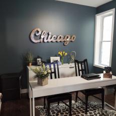 Savvy Navy Home Office With Metal "Chicago" Sign, Thin White Desk and Leopard Print Rug 