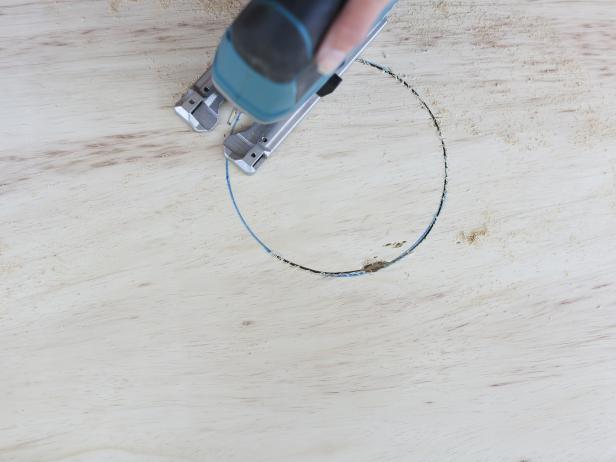 Carefully cut the circle out with a jig saw. With sanding block, lightly smooth the inside of the circle and raw edges of the board.