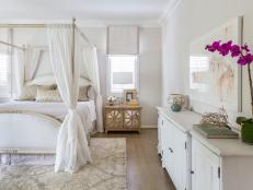 White Cottage Bedroom With Orchid