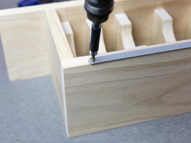 Create a wall mounted tape dispenser