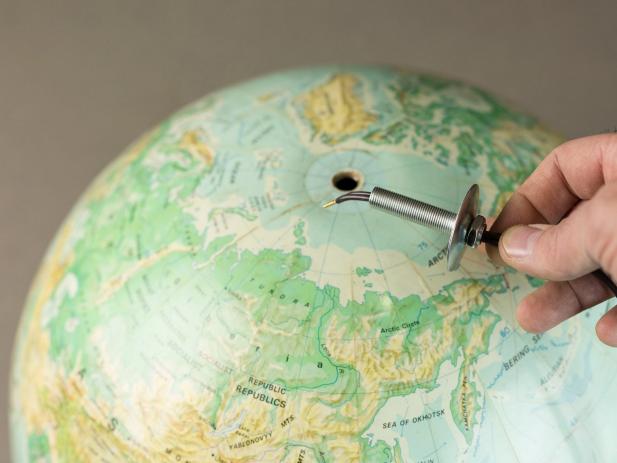 Create a hanging light from a vintage globe