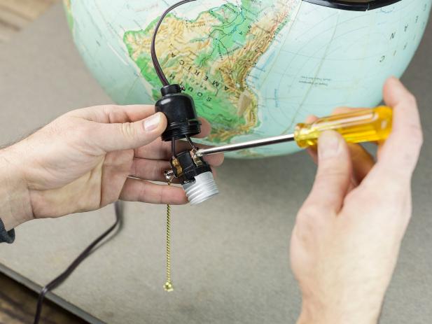Create a hanging light from a vintage globe