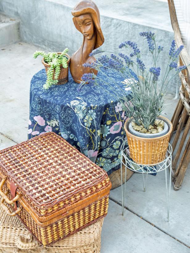 Vintage Baskets and Floral Fabric Decorate French-Inspired Patio Vintage Baskets and Floral Fabric Decorate French-Inspired Patio