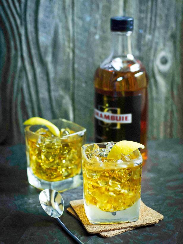 Rusty Nail Cocktail With Lemon Peel Garnish Rusty Nail Cocktail With Lemon Peel Garnish