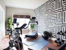 An energetic focal wall and top-of-the-line exercise equipment create a motivational environment for cardio and strength training.