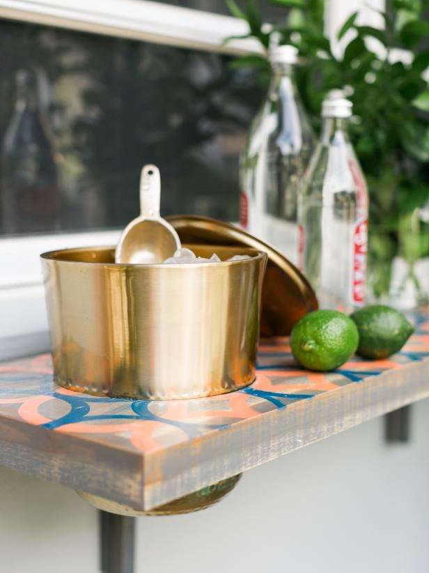 This versatile DIY drop down bar is perfect for small spaces, with a fun colorful pattern thatâll punch up your décor and just enough work surface to mix a cocktail or serve up brunch!