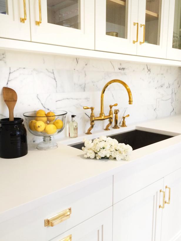 Kitchen Sink With Gold Faucet and White Counters Kitchen Sink With Gold Faucet and White Counters