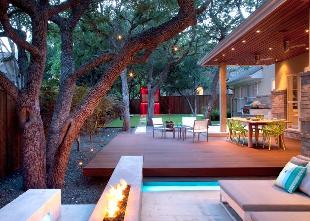 Outdoor Living Space Complements the Home and Existing Landscape Deck with Dining and Seating Area with Fire Pit