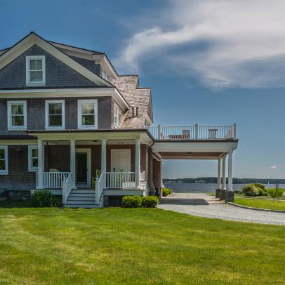 Cape Cod-Style House Exterior With Driveway Portico