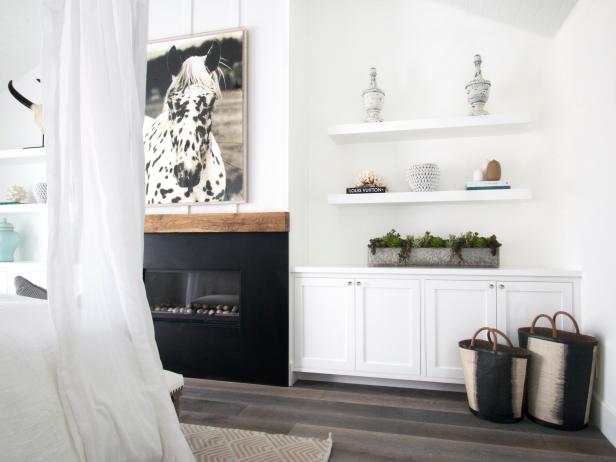 Modern Cottage Bedroom With Black Fireplace Modern Cottage Bedroom With Black Fireplace