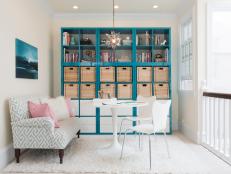 Eclectic Homework Area With Teal Bookshelves