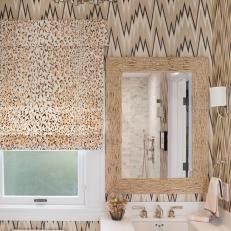 Leopard Print Roman Shade, Rope Framed Mirror and Neutral and Black Peak Pattern Wallpaper in Transitional Bathroom
