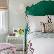Tall Green Headboard, Spotted Upholstered Stool and Crack Patterned Wallpaper in Transitional Bedroom 