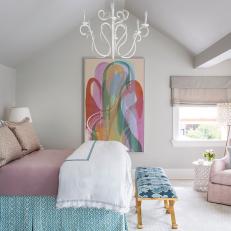 Transitional Bedroom With Colorful Wall Art, White Chandelier, Mauve Bed Linens and Patterned Blue Bench