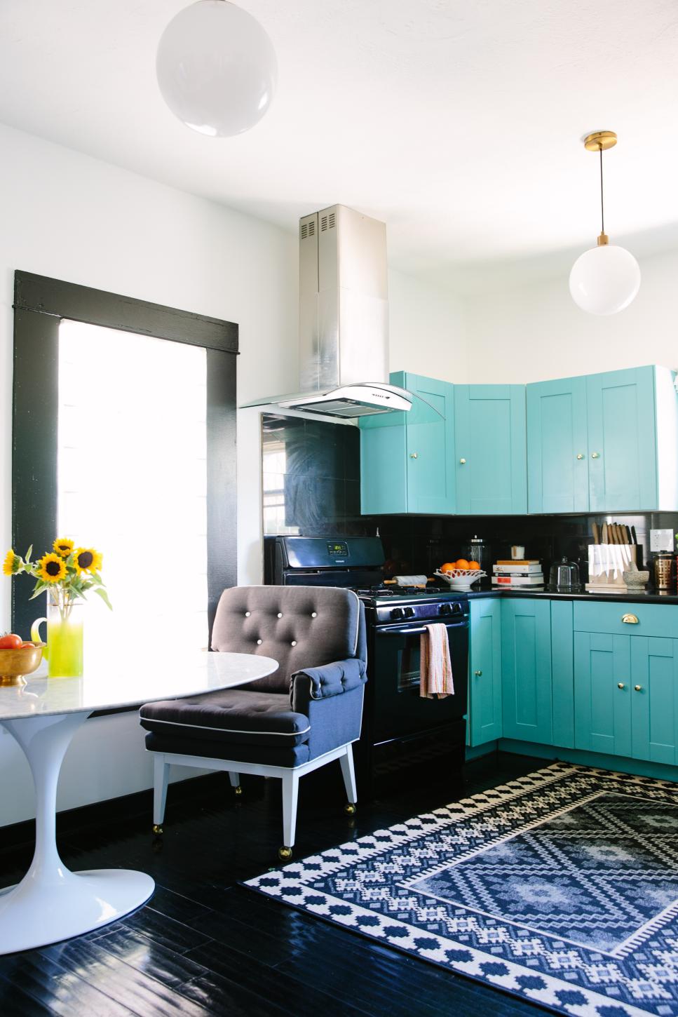 Kitchen With Black Flooring and Blue Cabinets Kitchen With Blue Cabinets