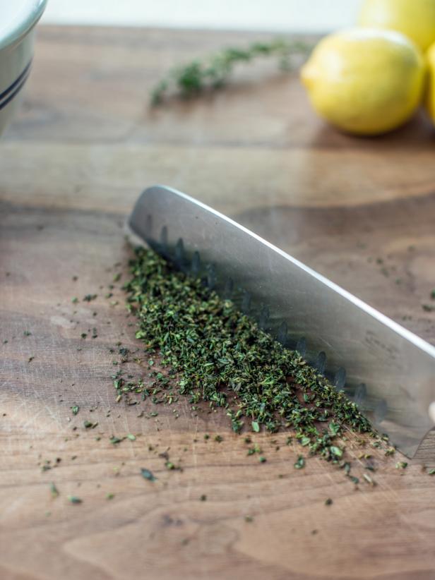 Step 1:Strip and Finely Chop Thyme LeavesUsing your fingers, strip fresh thyme leaves off stem. Finely chop with a chefâs knife. Drop in small mixing bowl and set aside.