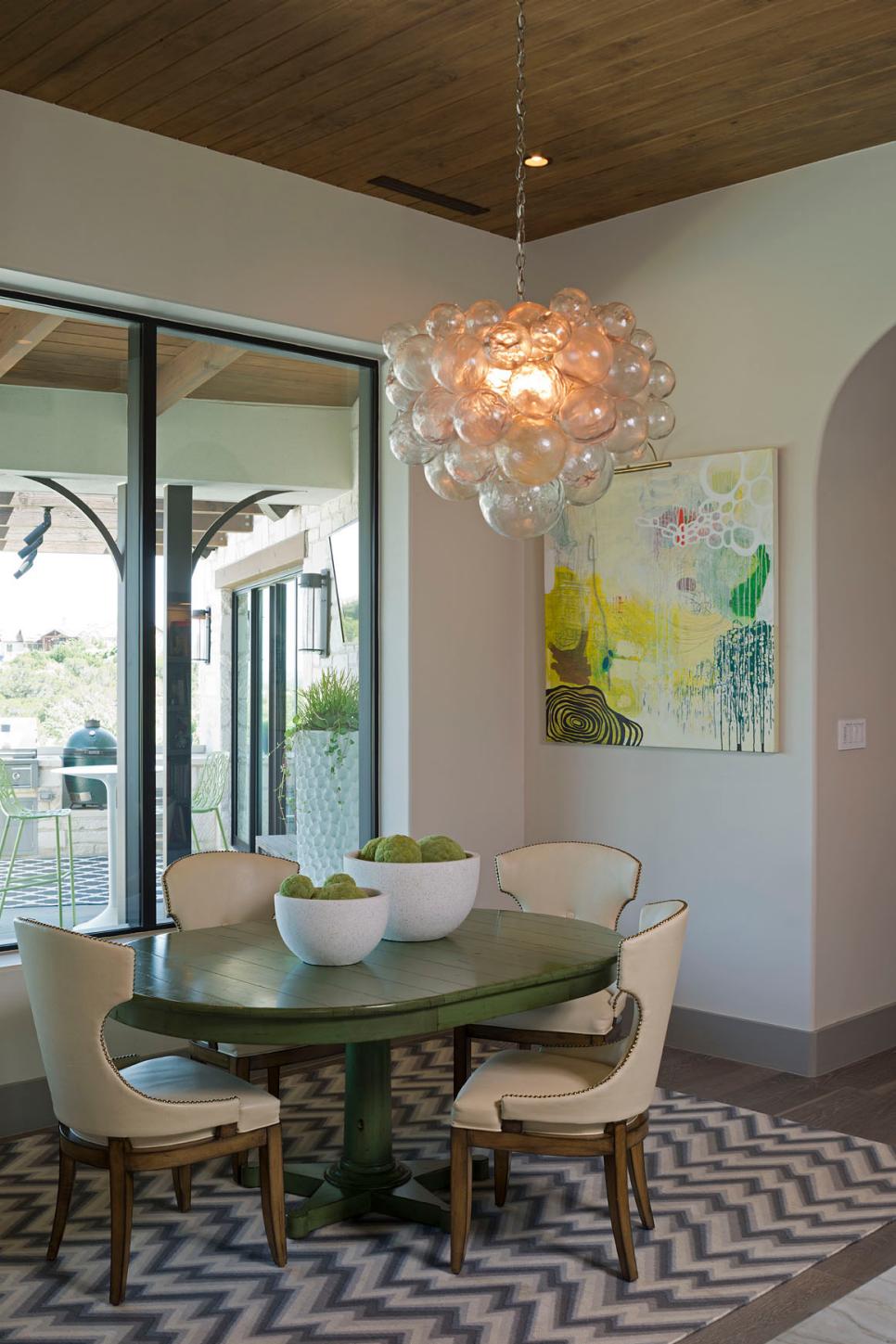 Dining Nook With Chevron Rug White Transitional Dining Room With Round Green Table