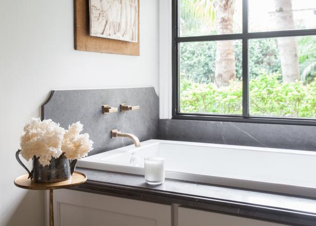 Soaking Tub With Gray Marble and Flowers Tub With Gray Marble