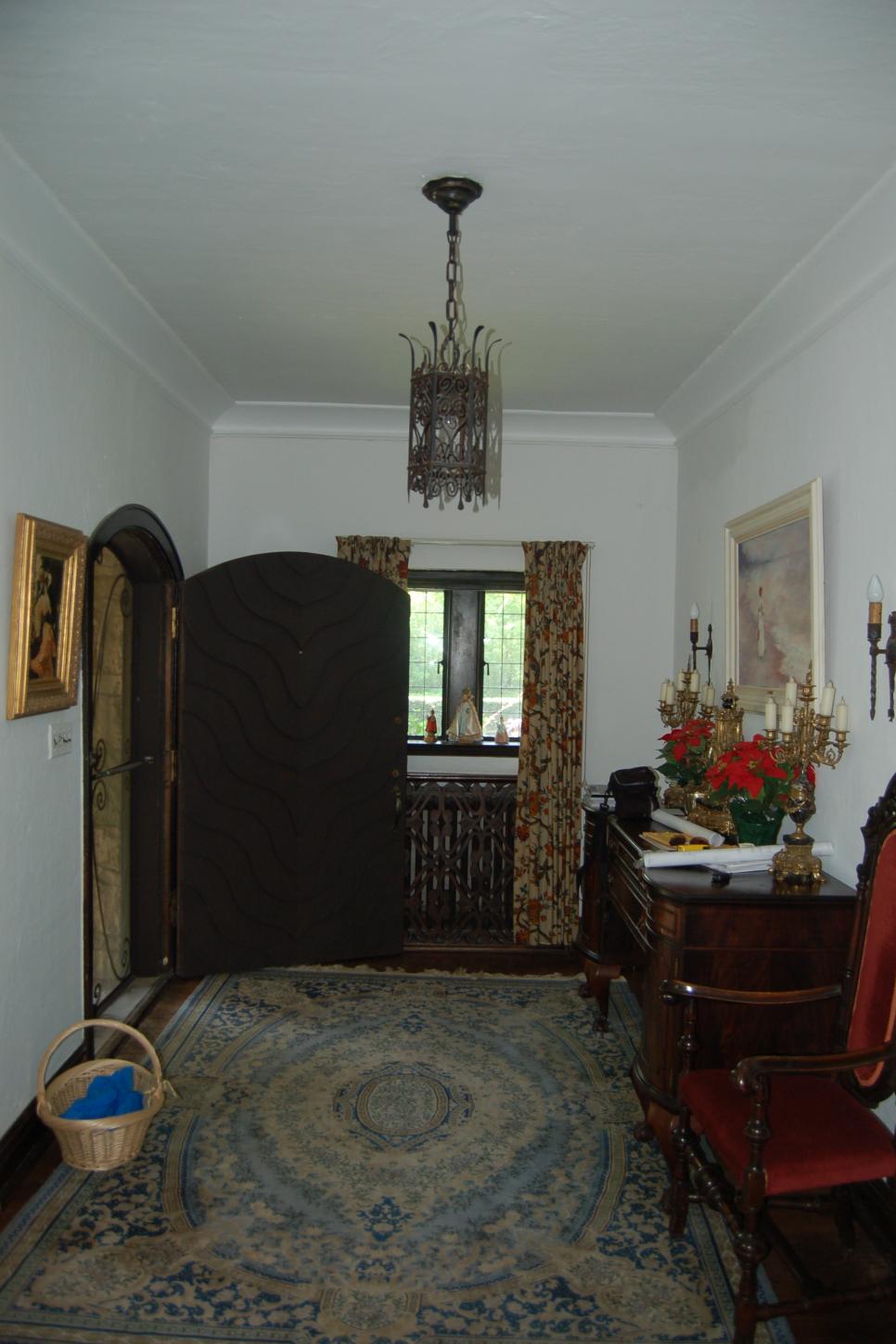 Before: Dark, Uninviting Foyer Before Photo of Foyer
