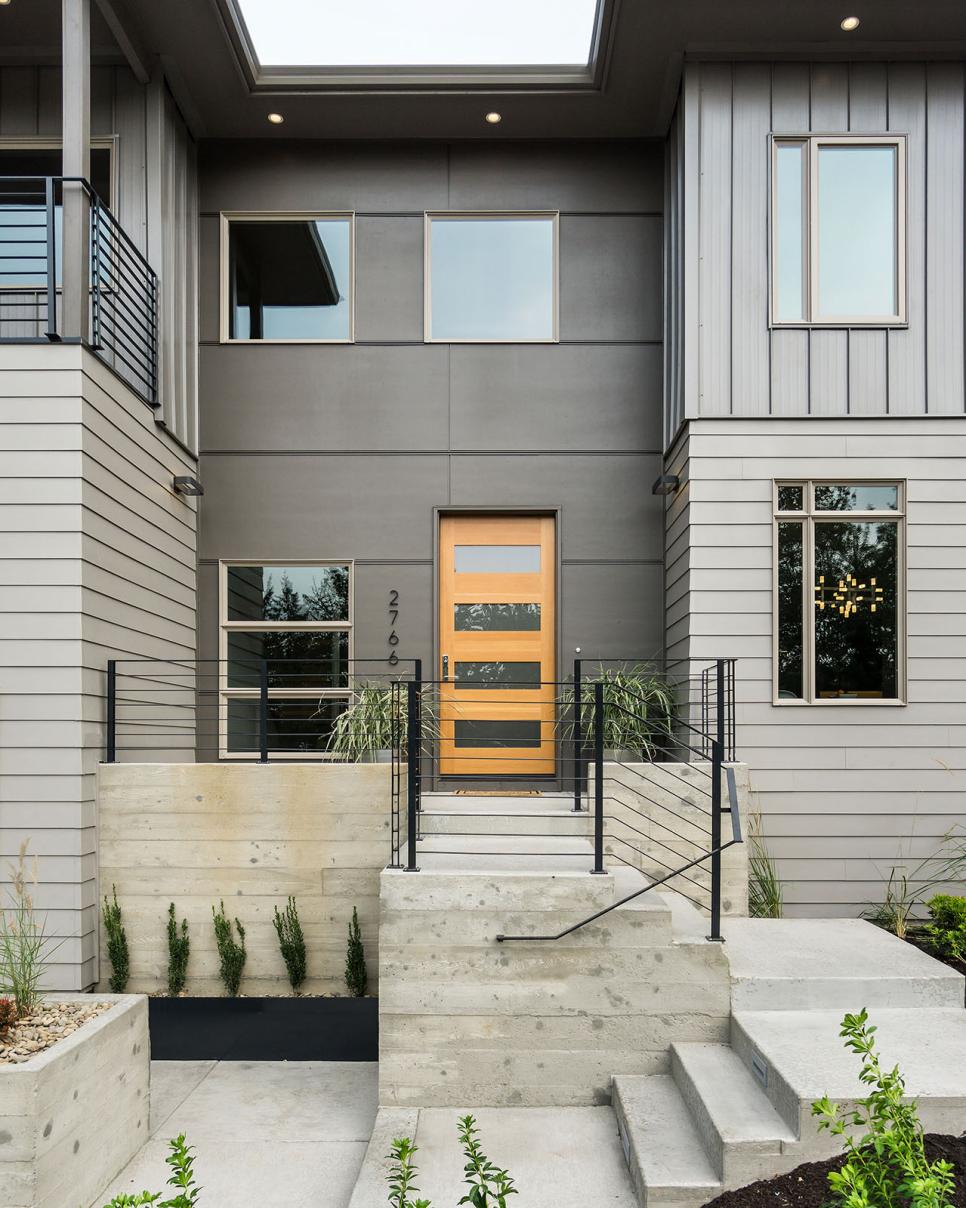 Front Entry to Contemporary Home Gray Contemporary Exterior With Concrete Stairs and Black Metal Rail