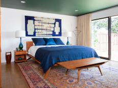 Persian Rug and Modern Furniture in Midcentury Modern Master Bedroom 