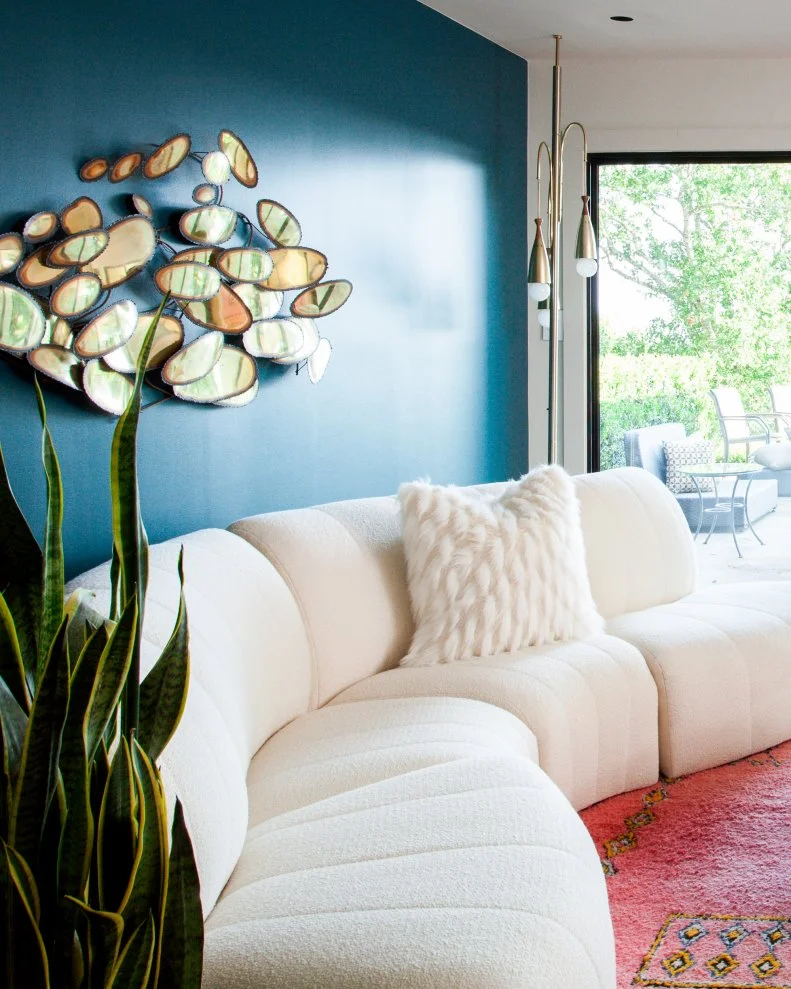 Red Rug and Teal Walls in Formal Sitting Room 