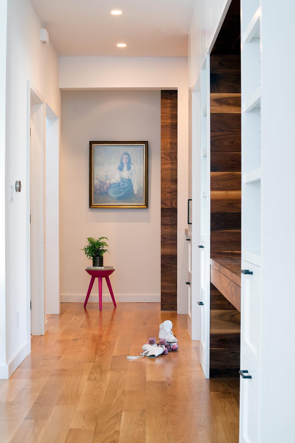 Bright, White Hallway With Light Wood Floor White Modern Hall With Light Hardwood Flooring & Dark Wood Nook