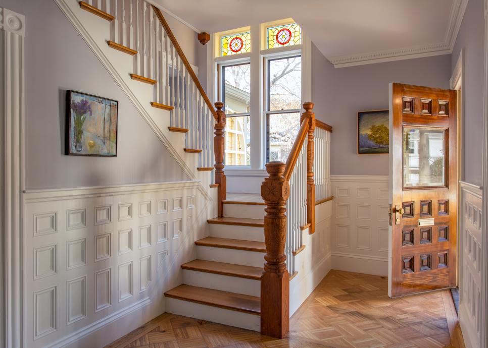 Blue Entryway With Staircase and Parquet Floor Blue Entryway With Staircase and Parquet Floor