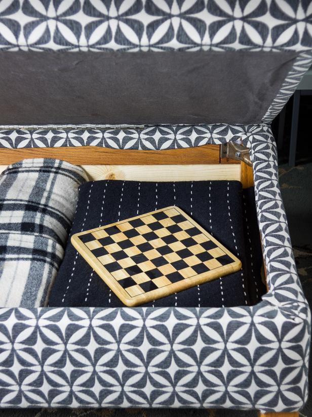 Turn an old coffee table into a stylish storage ottoman. It will be big enough to use as a coffee table with a tray, as extra seating, or just a great place to prop up your feet at the end of the day. The handy lift lid reveals plenty of storage for throws, books, or board games.
