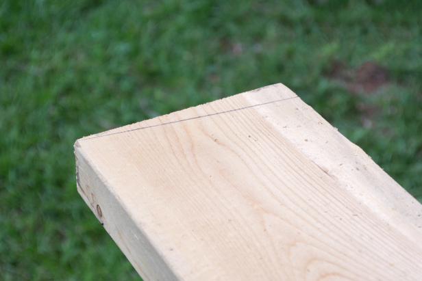 Beginning at the back end, mark an 8-degree angle with the open end on the bottom.