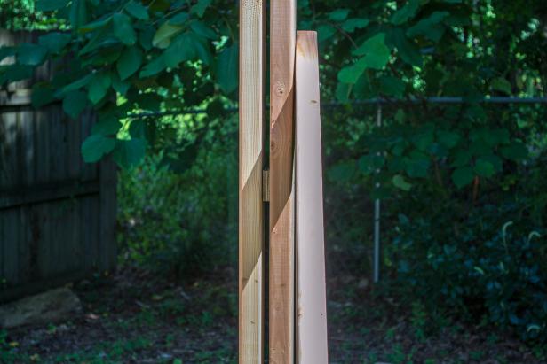 Use boards to temporarily brace the walls into place until all walls are complete and fastened together.