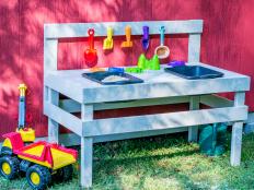 Keep the kids entertained for hours with this outdoor play bench where they can cook up muddy creations, build sand castles or play with tractors all day long.