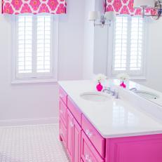White And Pink Bathroom Transitional Windsor Smith Home Pretty S Bathroom Features Walls Painted Pink Lined With A White Dual Washstand Topped Thick Quartz Ed Two Sinks And Polished