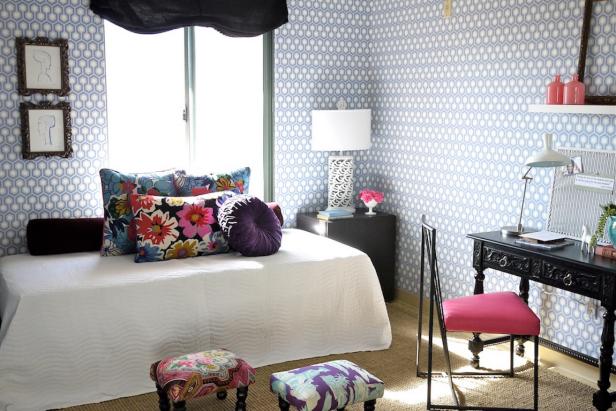 Floral Pillows Complement Geometric Wallpaper in Feminine Studio Apartment Floral Pillows Complement Geometric Wallpaper in Feminine Studio Apartment