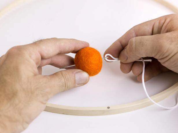 Create a colorful felt ball mobile