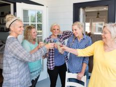 Monica Potter, her sisters Jessica, Bridgette, Kerry and mom Nancy (L-R) all enjoy a lemonade toast on the back patio as seen on Welcome Back Potter. (action)